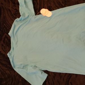 Wonder Nation Short Sleeve Rash Gaurd matches the swim truncks